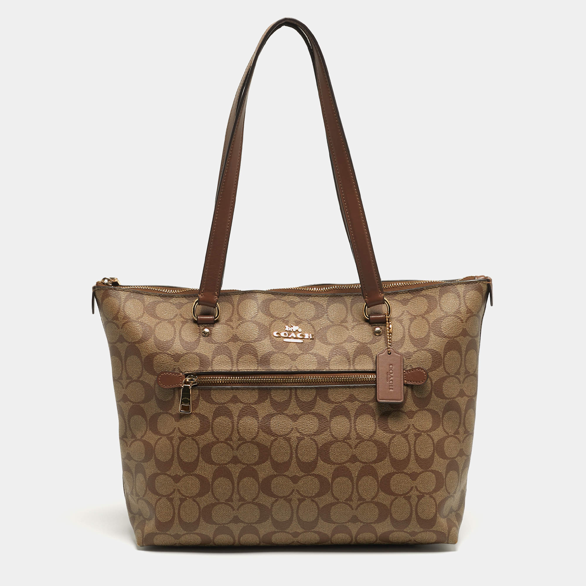 Pre Owned Coach Gallery Beige/Brown Signature Coated Canvas and Leather Tote