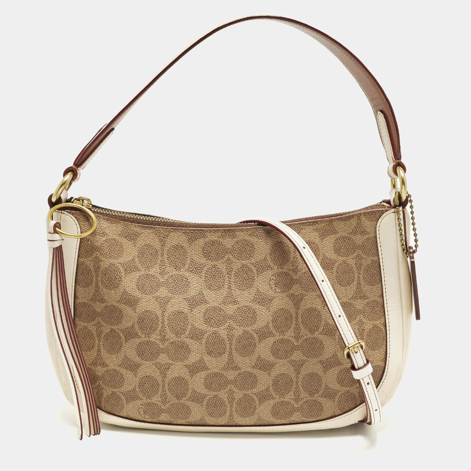 Pre Owned Coach Sutton Off White/Brown Signature Coated Canvas and Leather Crossbody Bag