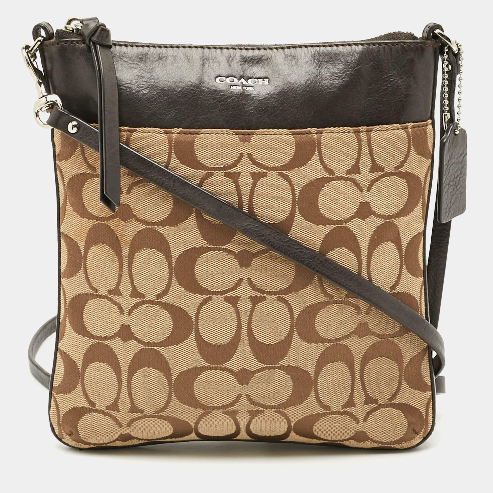 مملوكة مسبقًا Coach Swingpack Dark Brown/Beige Signature Canvas and Leather Crossbody Bag