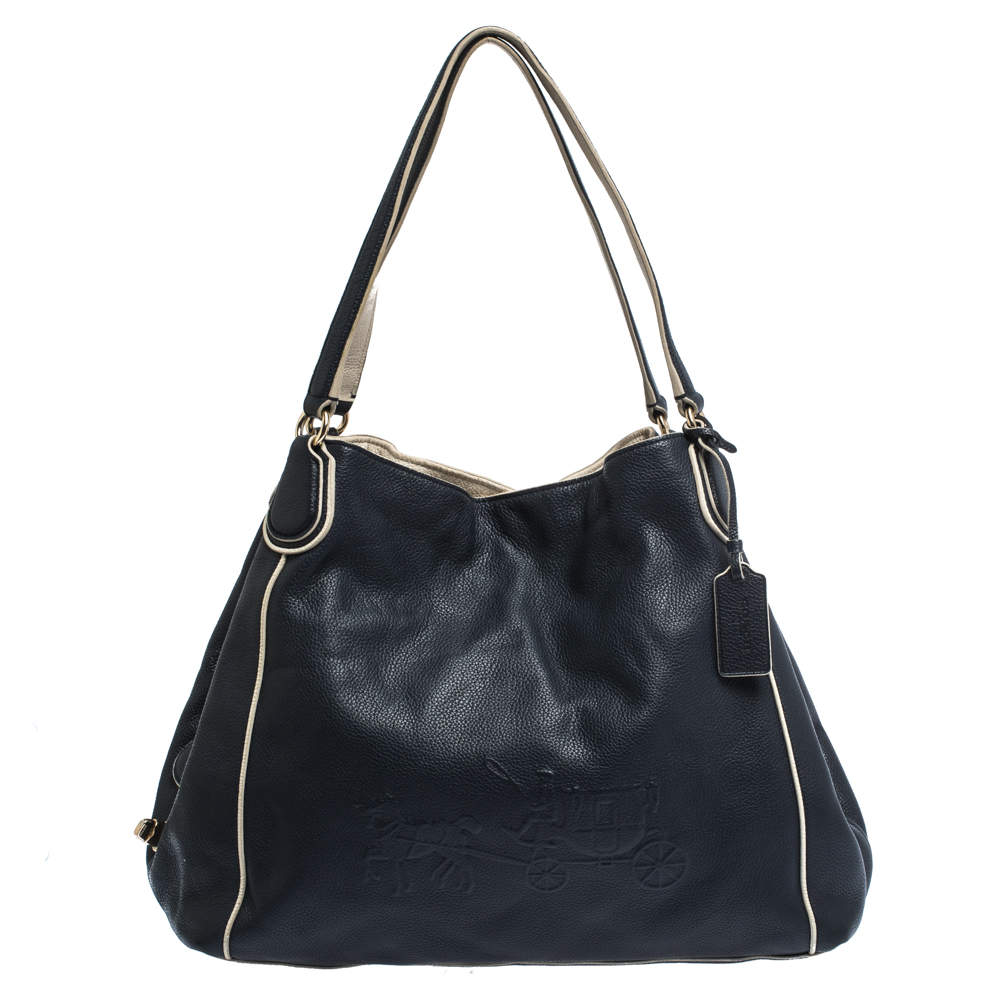 navy blue and white coach purse