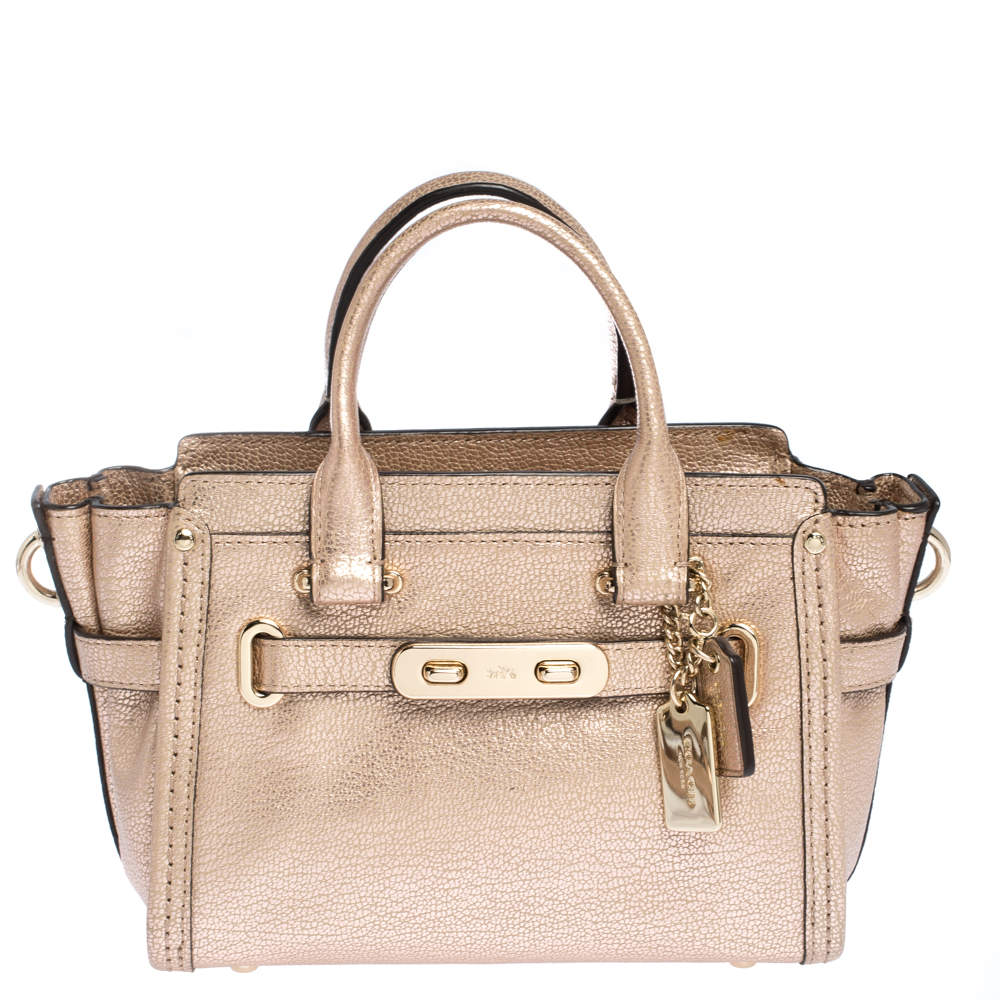 metallic rose gold handbag