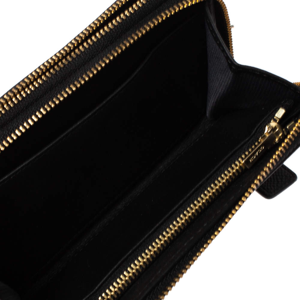 Coach single zip wallet black top and gold