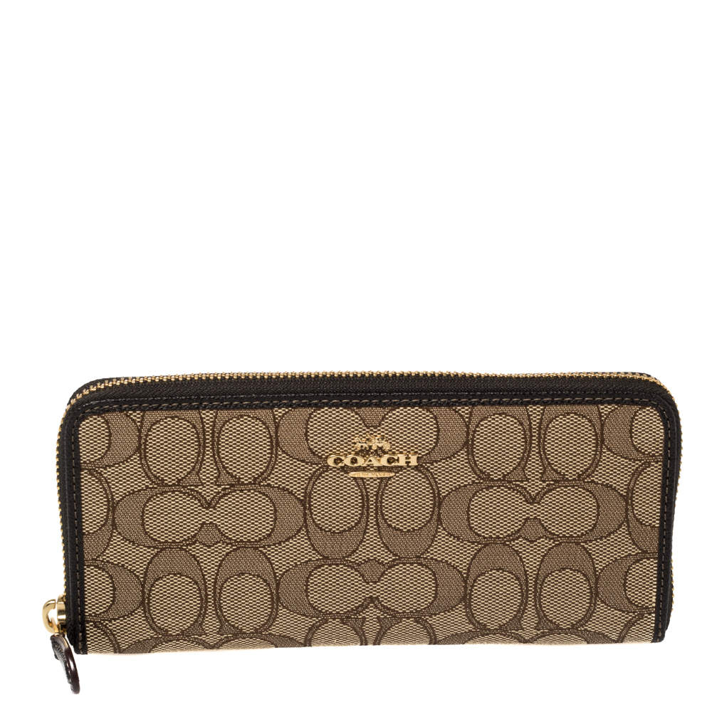 Pre Owned Coach Beige/Brown Signature Canvas and Leather Zip Around Wallet