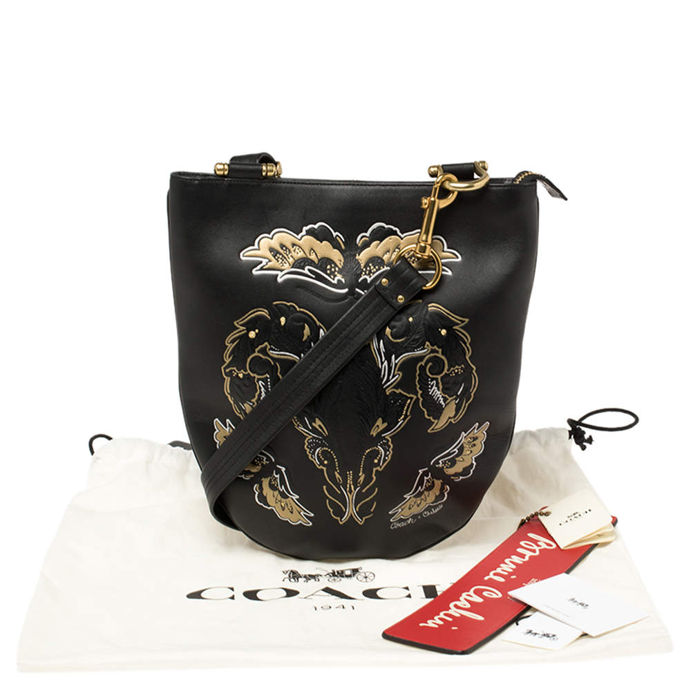 Coach sling bag store with tattoo