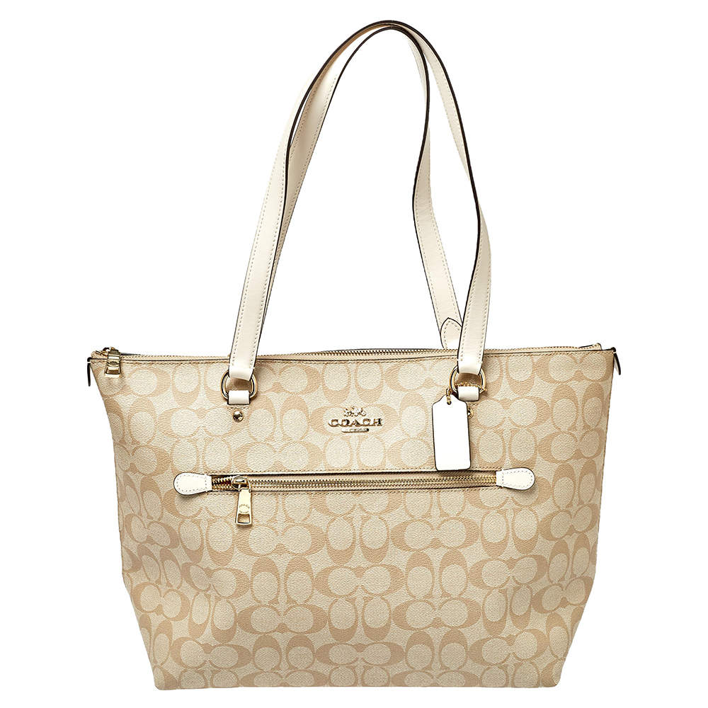 Pre Owned Coach Beige/White Signature Coated Canvas and Leather Gallery Tote