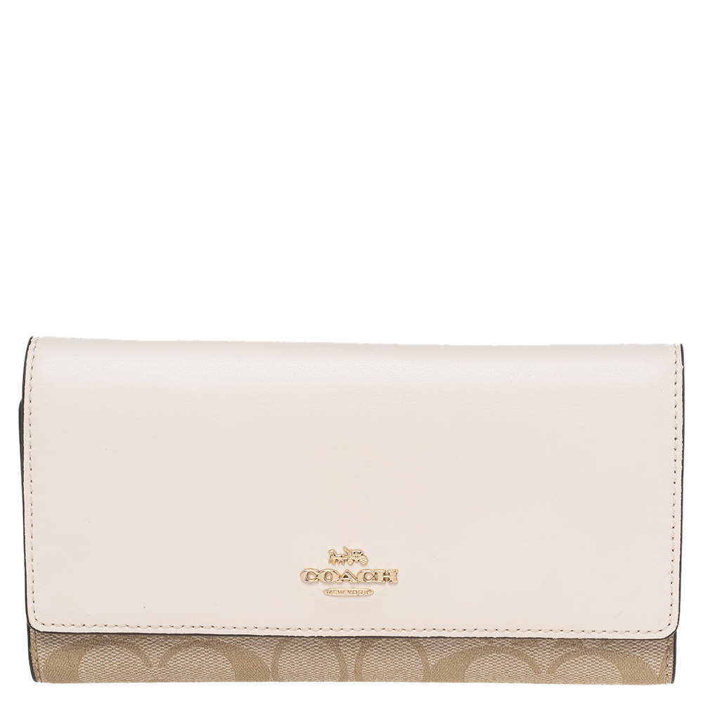 Pre Owned محفظة كوتش كانفاس بالشعار وجلد بيج/كريمي ثلاثية الطية 