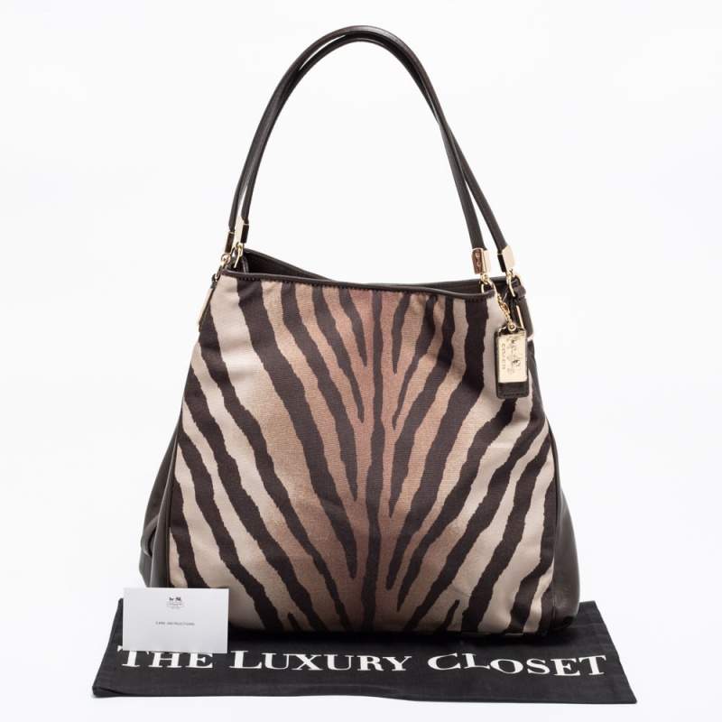 Zebra stripped selling Coach mini bag