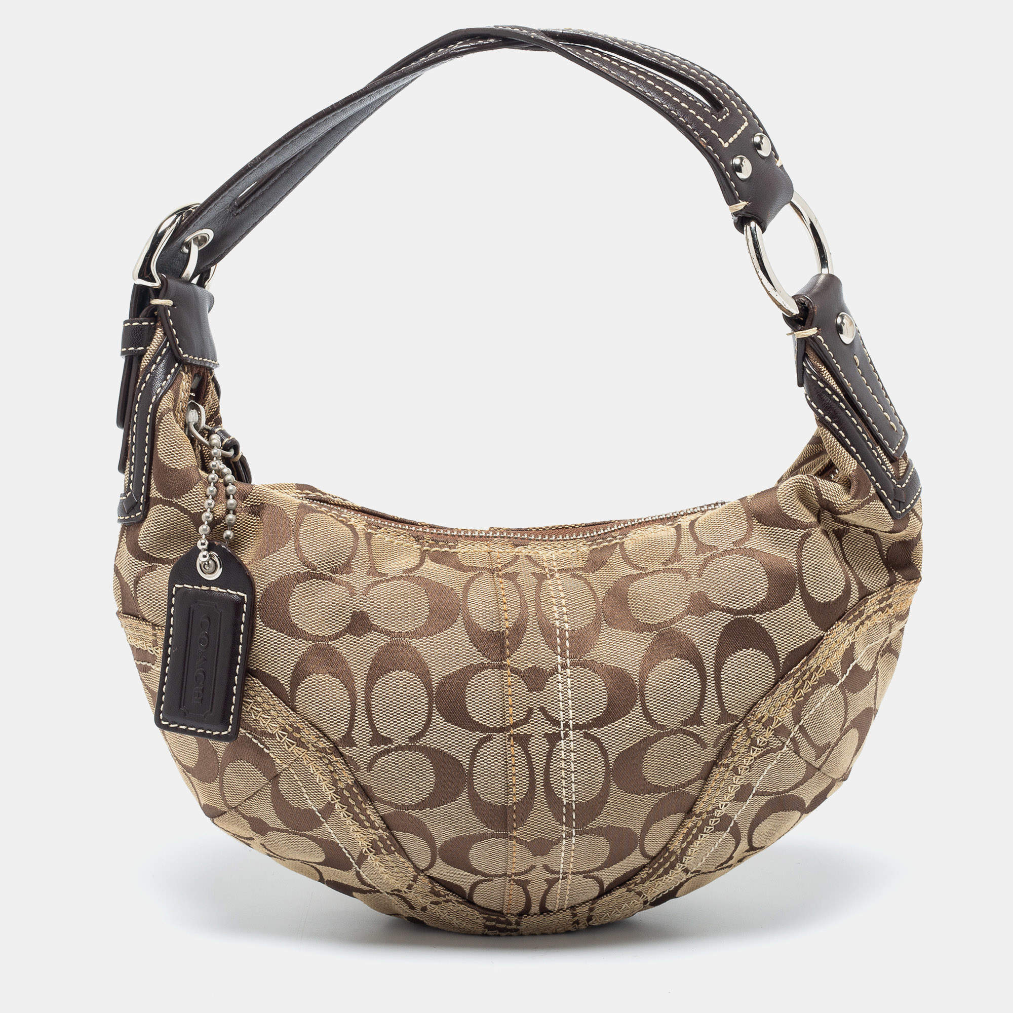 Pre Owned Coach Beige/Brown Signature Canvas and Leather Soho Hobo