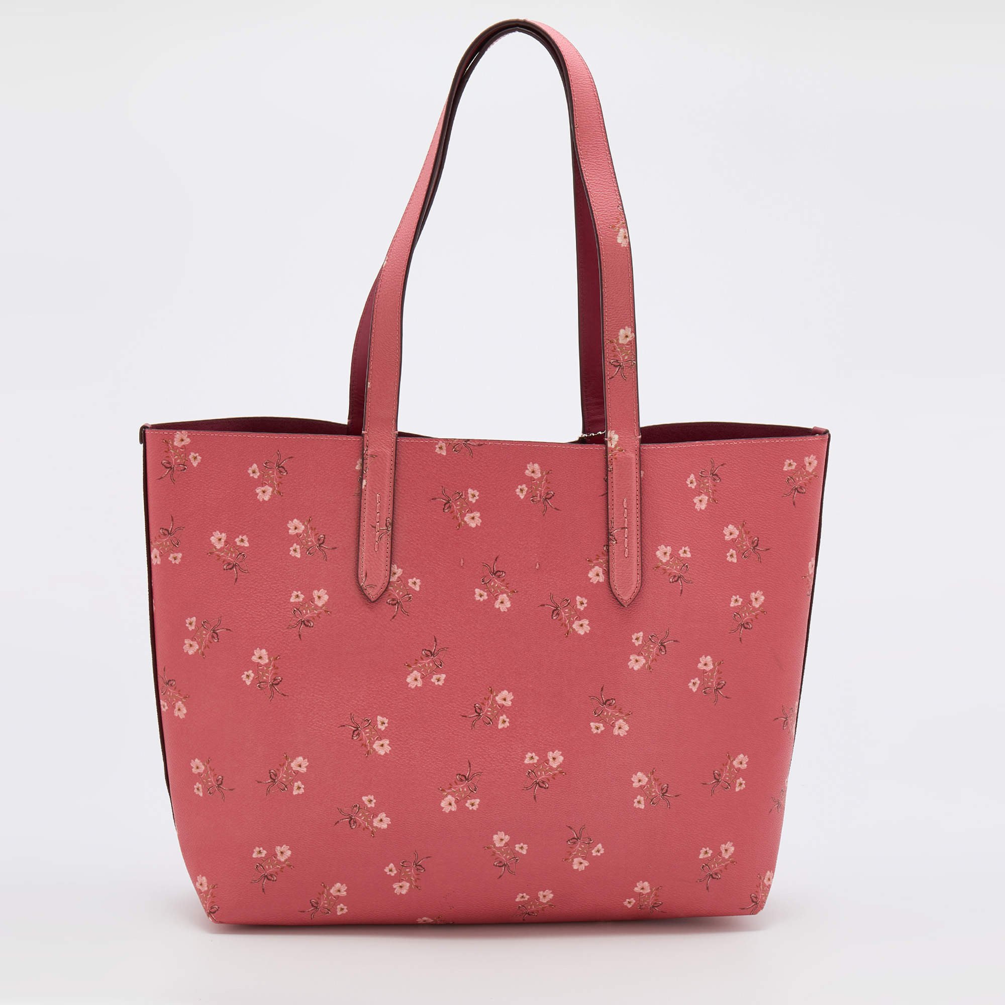 Coach highline tote with floral print best sale