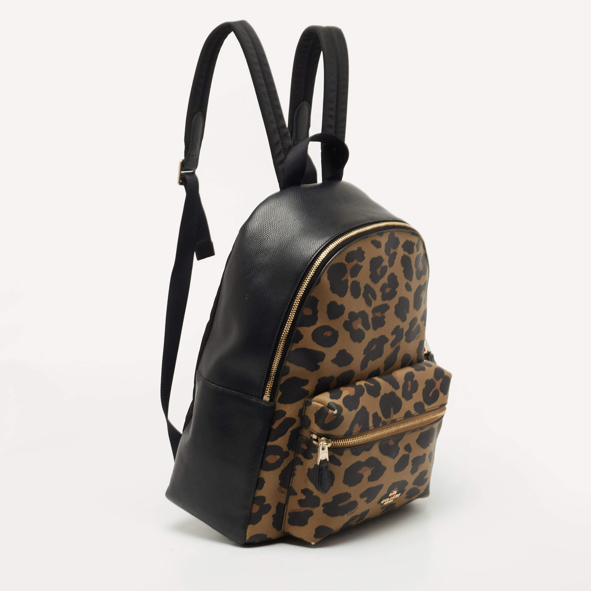 Cheetah print coach backpack hot sale