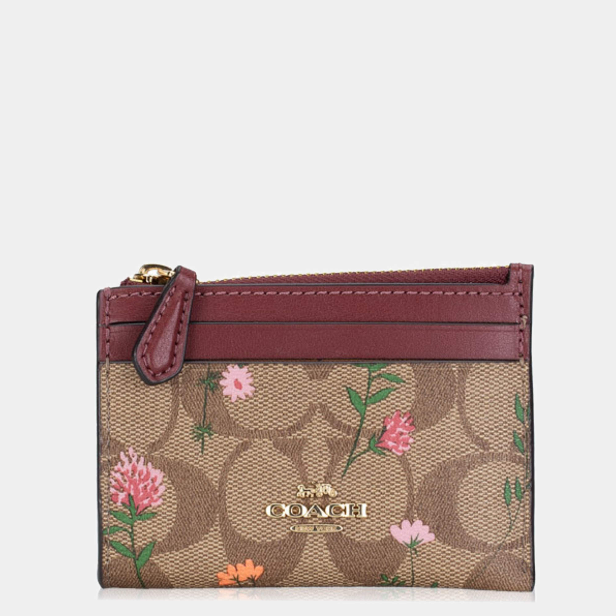 Pre Owned Coach Brown/Burgundy Signature Floral Print Coated Canvas and Leather Zip Skinny ID Case