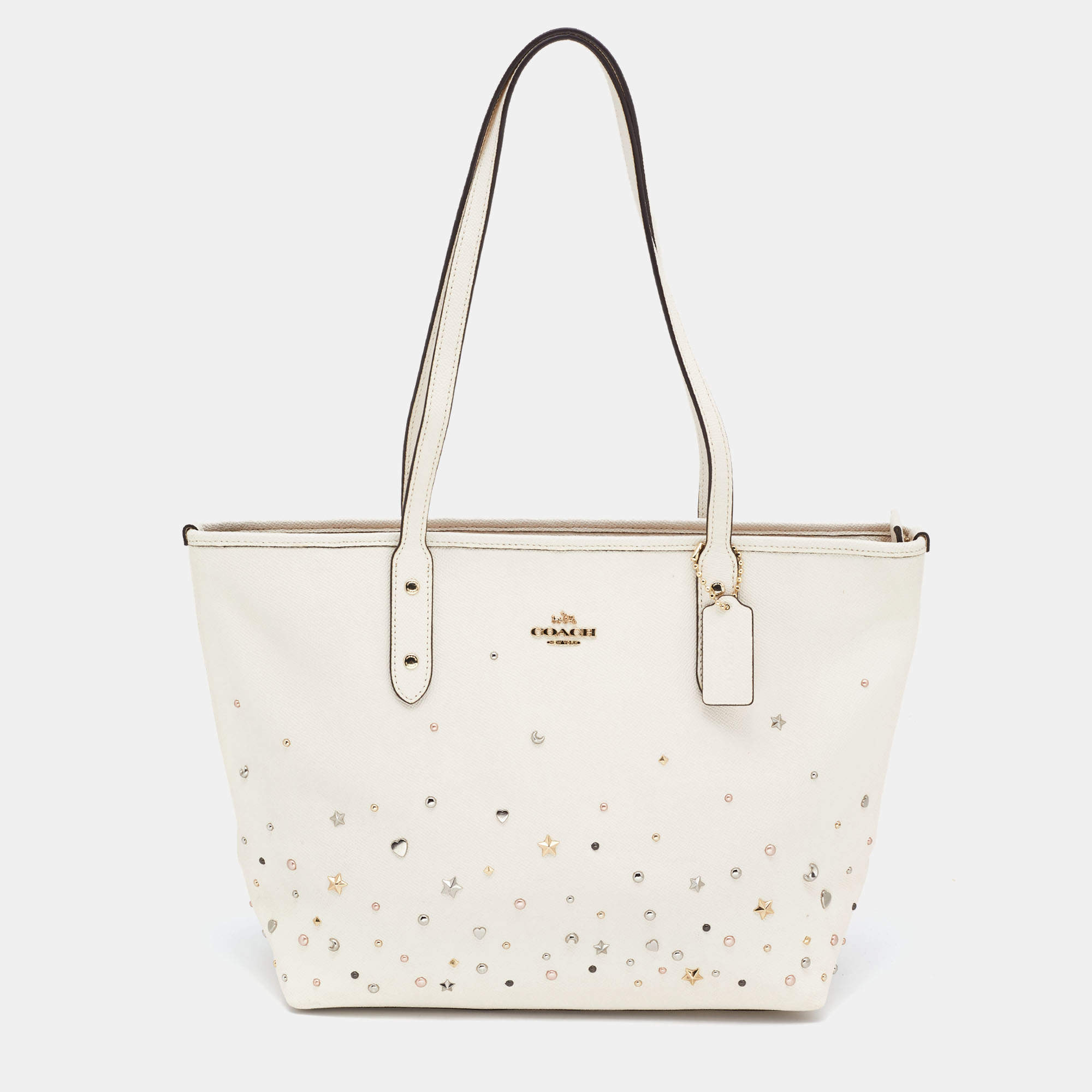 Pre Owned Coach Ivory Leather Stardust Studs City Zip Tote