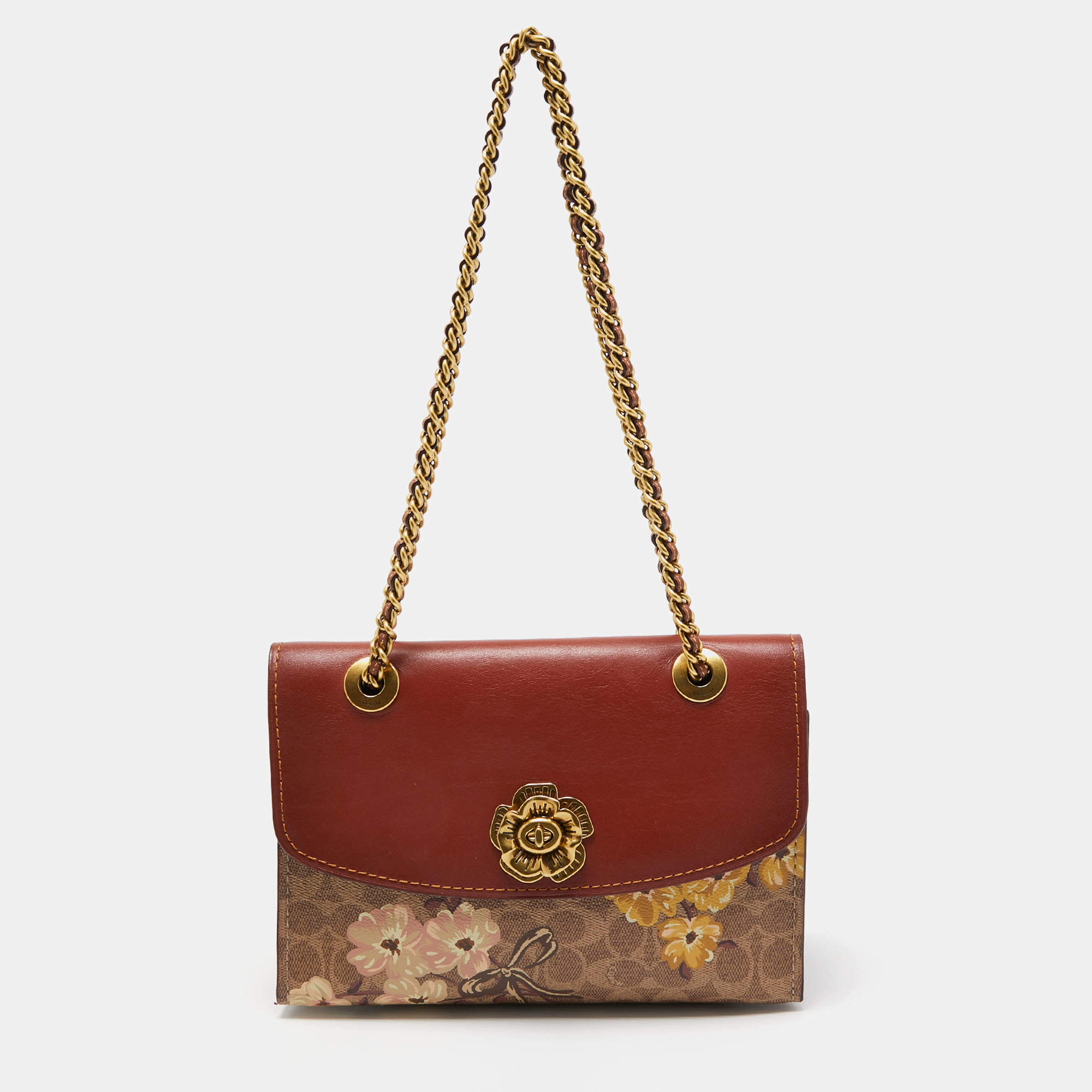 Pre Owned Coach Brown/Beige Signature Coated Canvas and Leather Parker Shoulder Bag