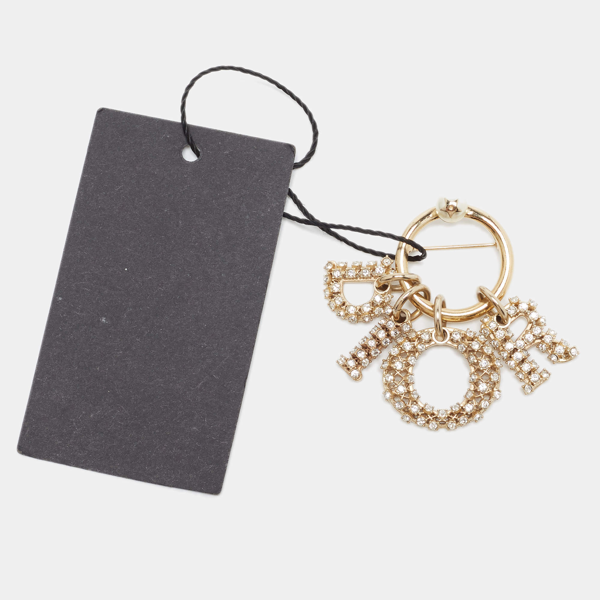 Pre Owned Dior Ramadan Edition Gold Tone Logo Crystal Embellished Charm Brooch