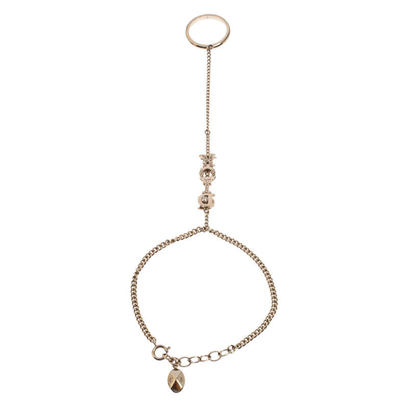 مملوكة مسبقًا مجوهرات يد ديور شعار مرصع كريستال ذهب وردي اللون