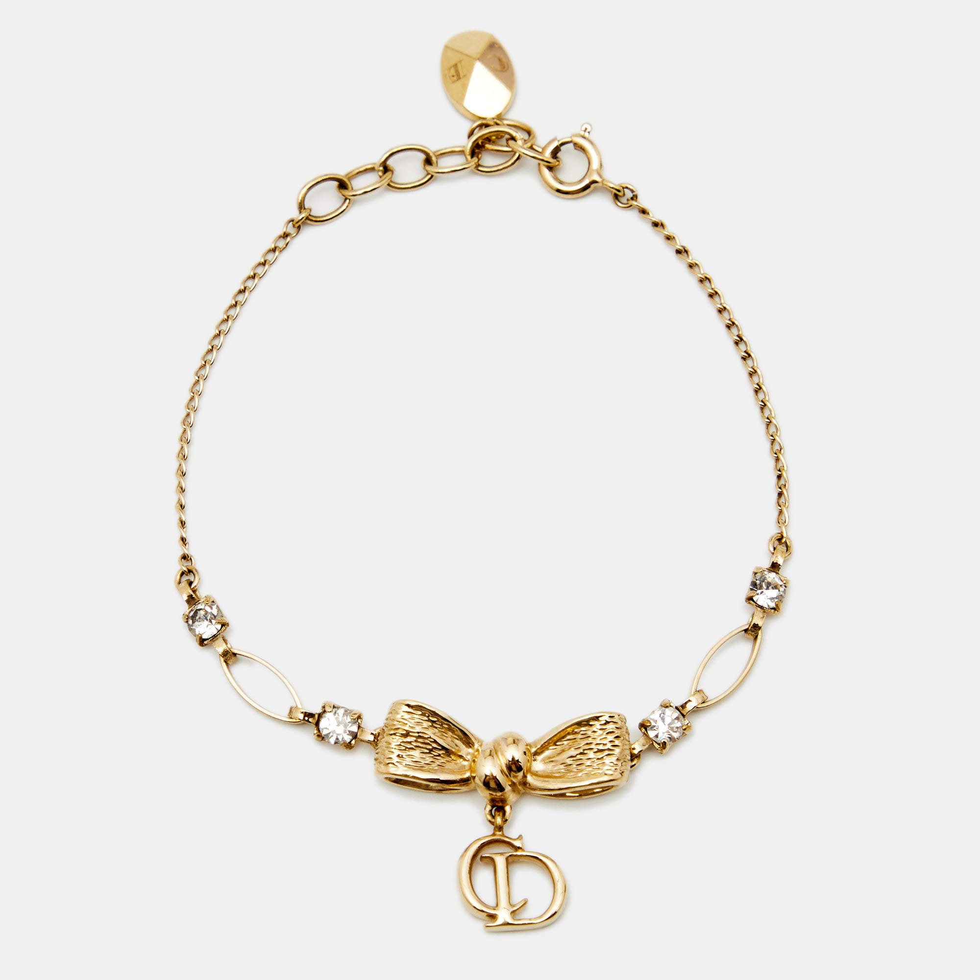 Dior Vintage Gold Tone Crystal Bow Charm Bracelet
