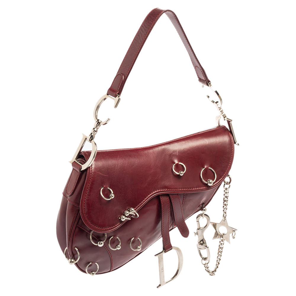 Dior pierced shop saddle bag