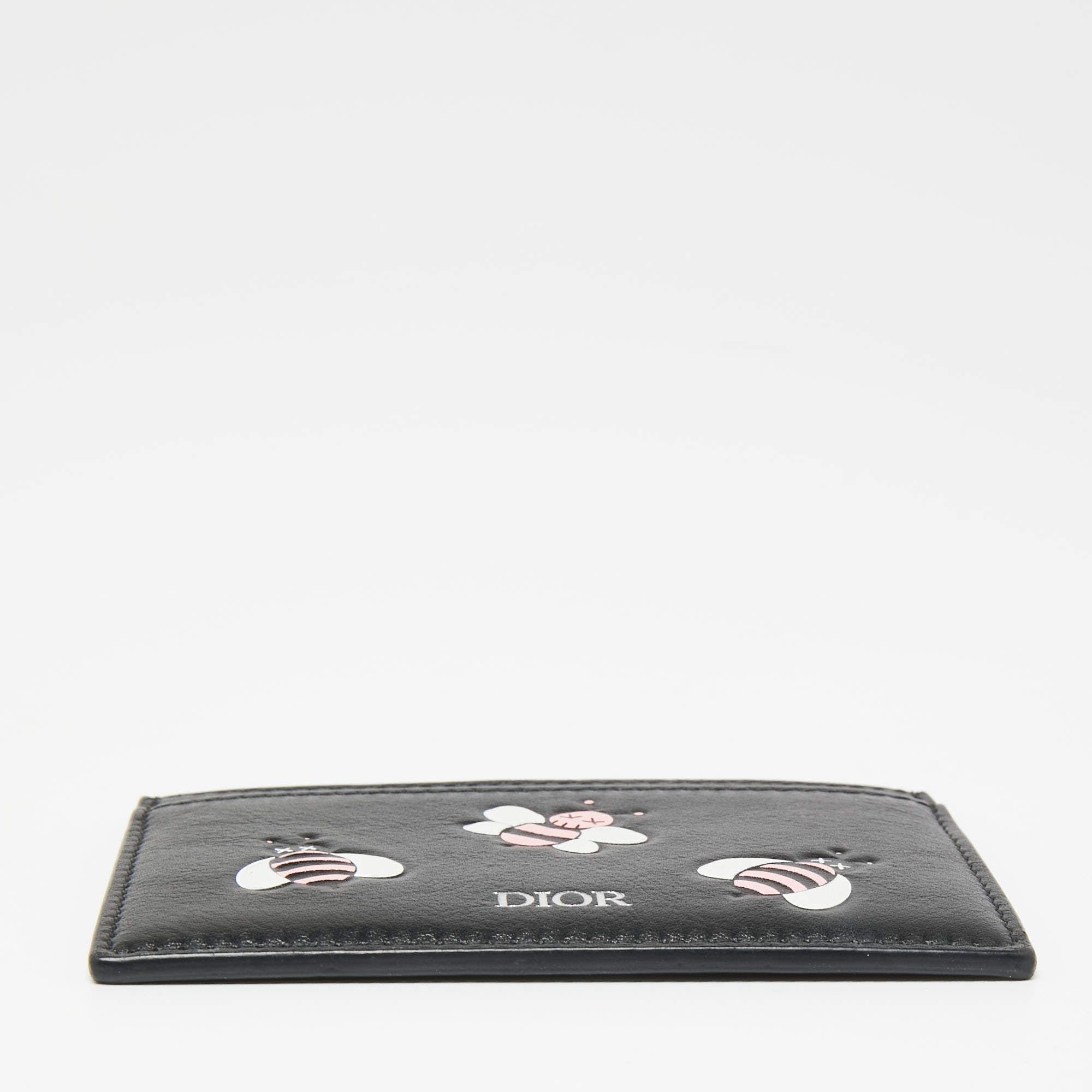 Dior x kaws black card outlet holder with pink bees