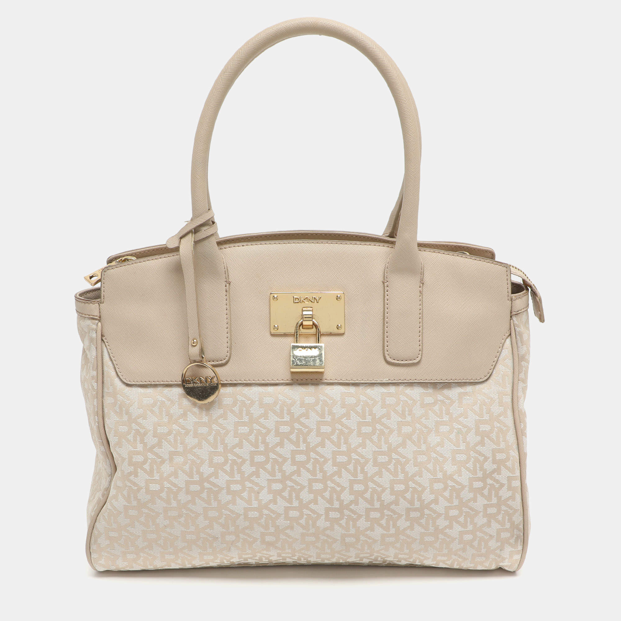 Pre Owned Dkny Heritage Lock Light Beige Signature Canvas and Leather Tote