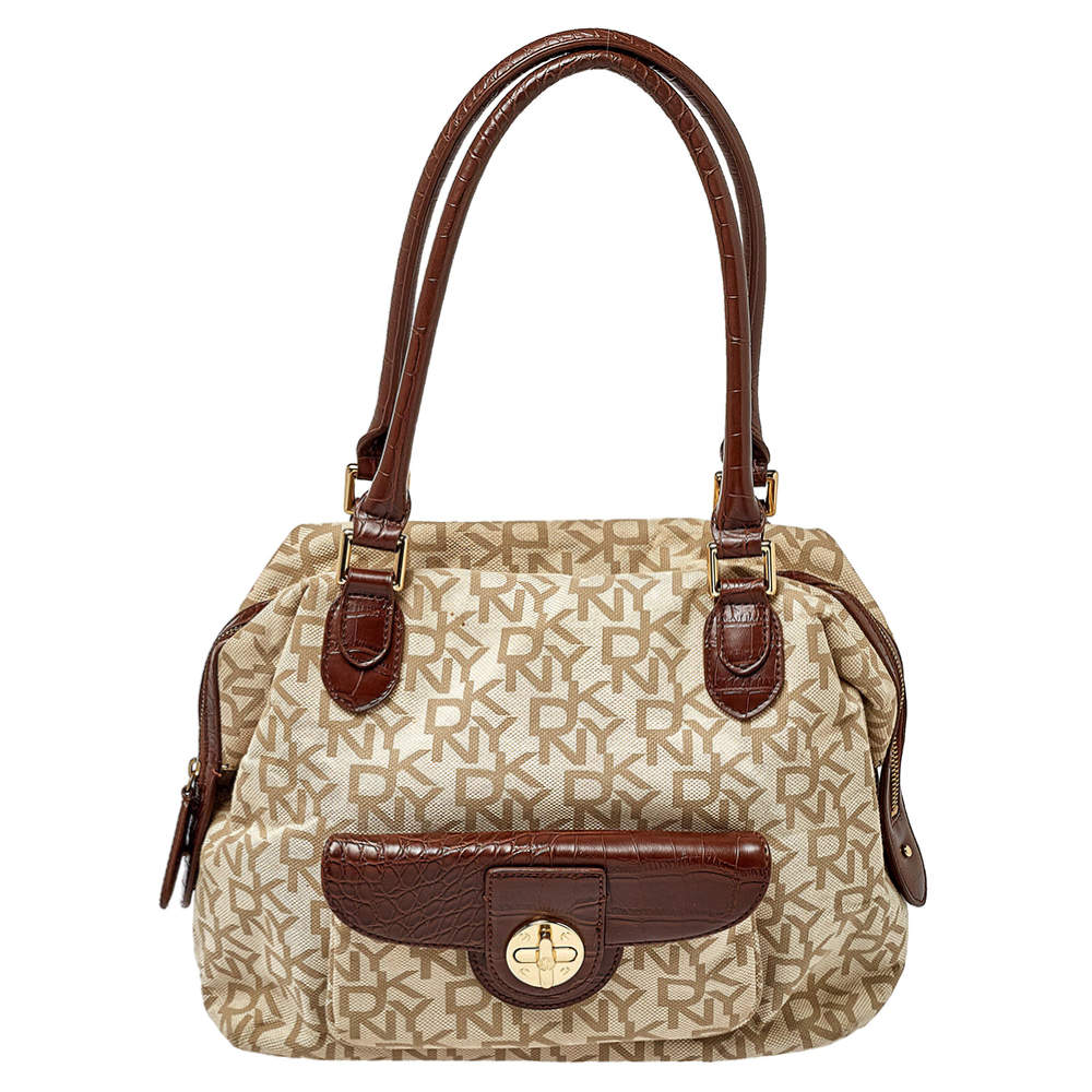 Pre Owned حقيبة دي كي إن واي كانفاس مونوغرامي وجلد نقشة التمساح بيج/بني بقفل دوار وجيب