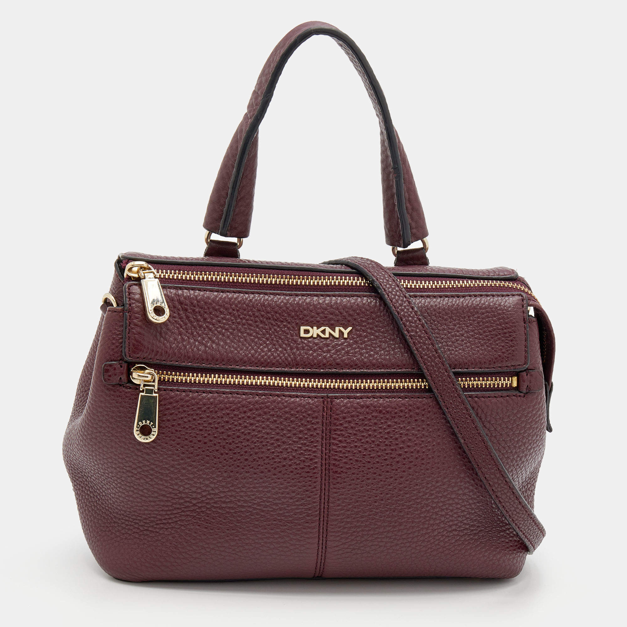 Pre Owned حقيبة ساتشل دي كي إن واي جلد مُحبب برقوقي