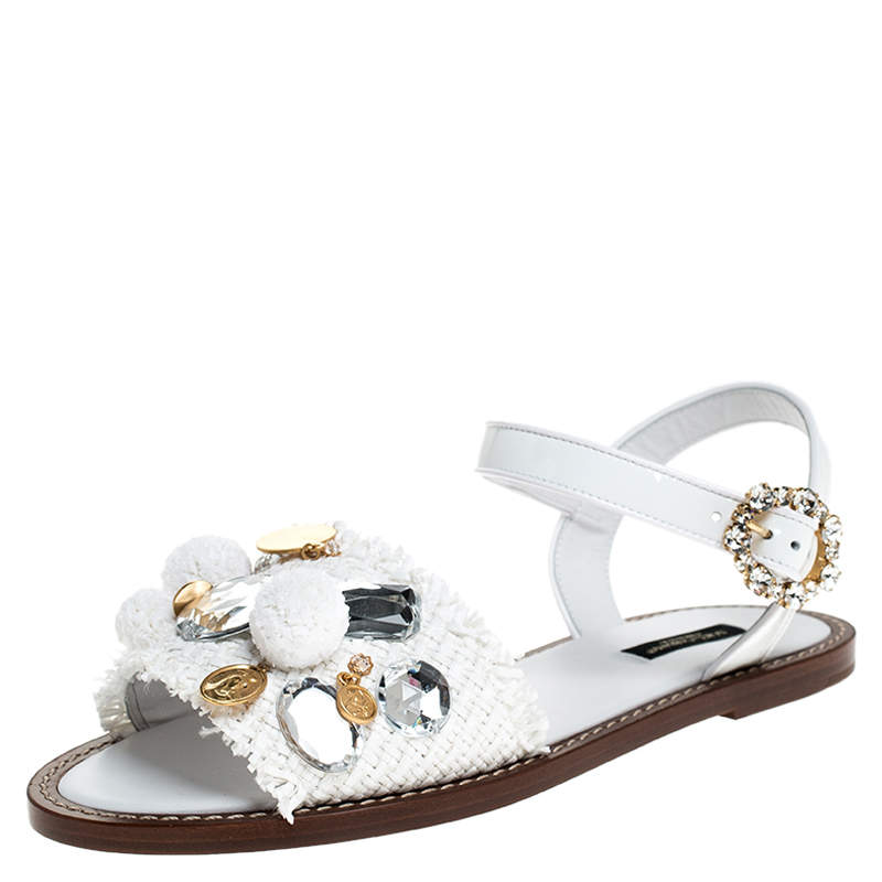 مملوكة مسبقًا Dolce & Gabbana White Patent Leather And Raffia Pom Pom Crystal Embellished Flat Sandals Size 37.5