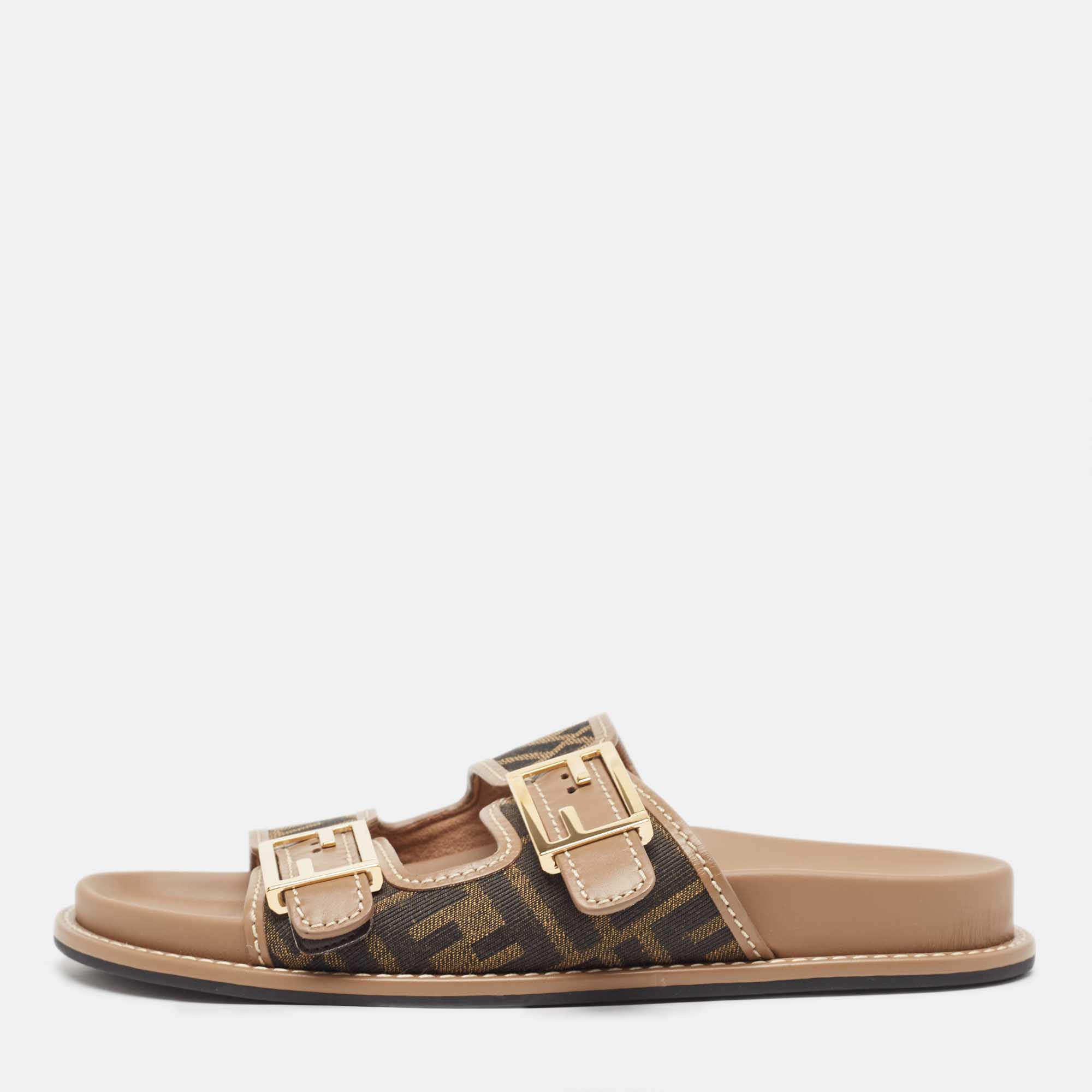 مملوكة مسبقًا Fendi Brown Zucca Canvas and Leather FF Buckle Detail Slides Size 38