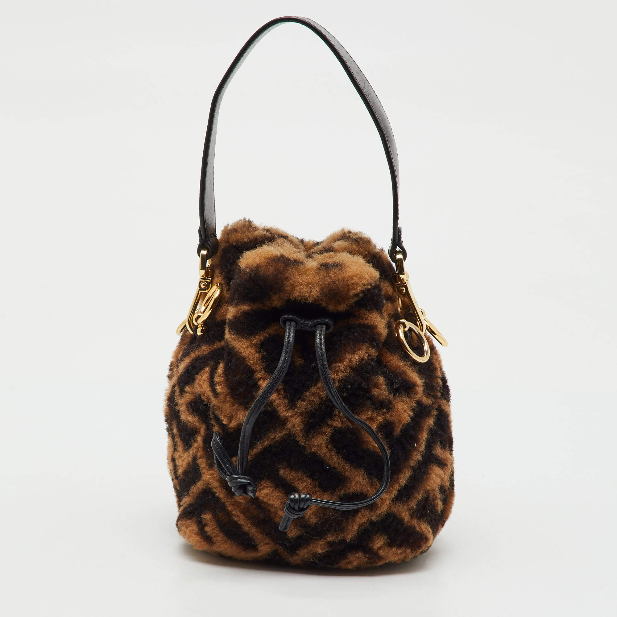 Pre Owned Fendi Brown Shearling Fur and Leather Mini Mon Tresor Drawstring Bucket Bag