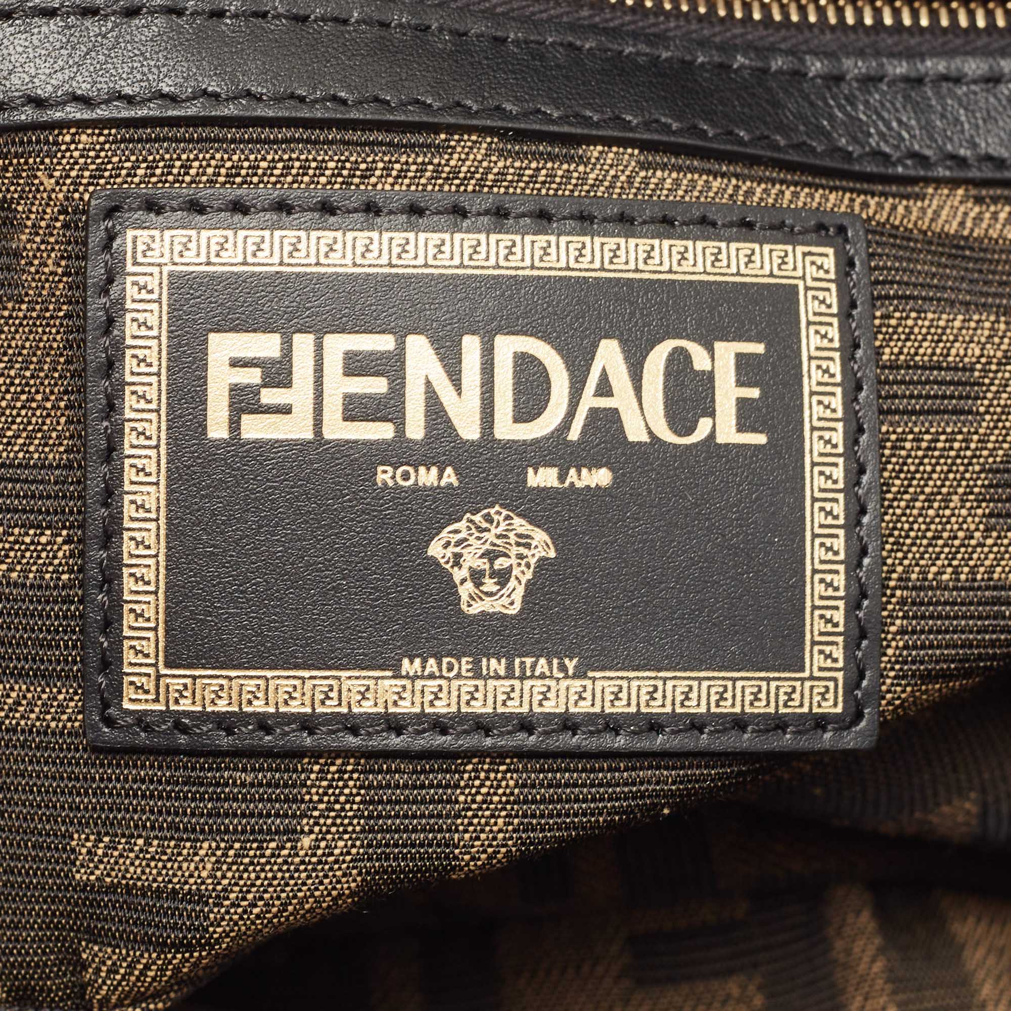 Fendi x Versace Fendace Blue/Black Denim and Leather Fendace Patchwork  Baguette Bag Fendi x Versace | The Luxury Closet