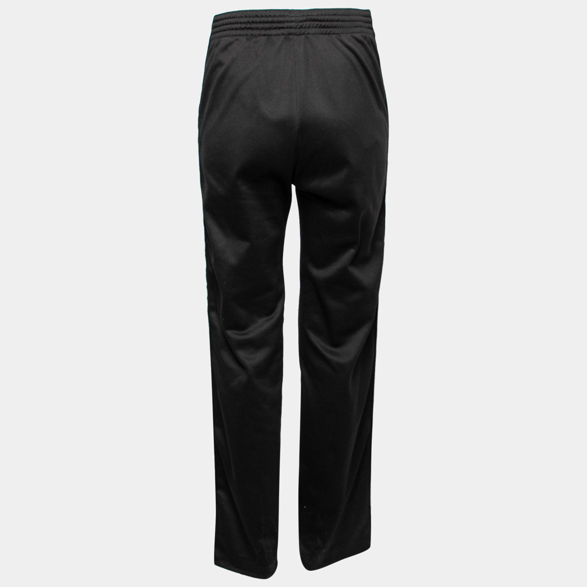 Logo slim jersey track pants in black - Givenchy | Mytheresa