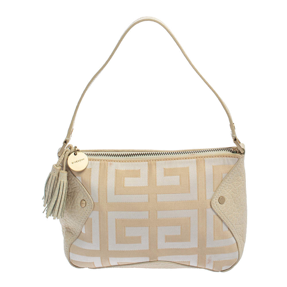 Pre Owned Givenchy Cream/White Monogram Canvas And Leather Tassel Baguette