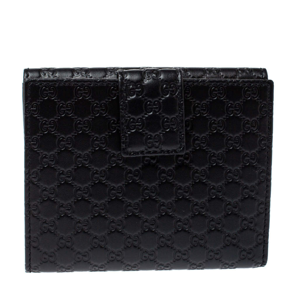 مملوكة مسبقًا Gucci Black Microguccissima Leather French Flap Wallet