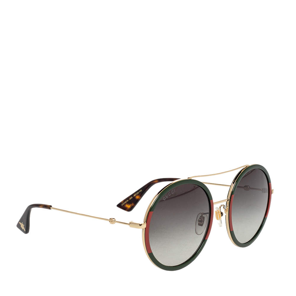 Pre Owned نظارة شمسية غوتشي GG0061S مستديرة أحمر / أخضر متدرج