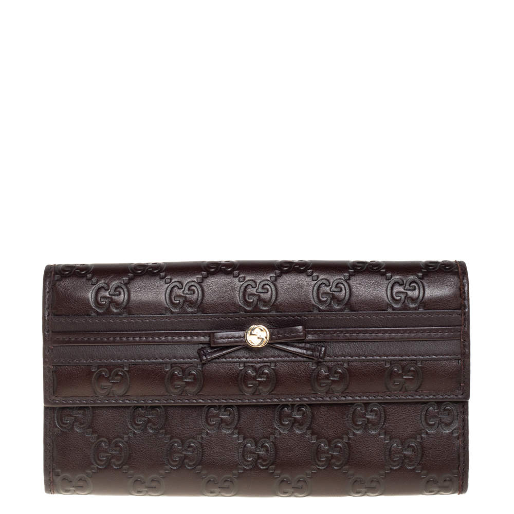 مملوكة مسبقًا محفظة غوتشي كونتينينتال مايفاير مزينة فيونكة جلد غوتشيسيما بني داكن