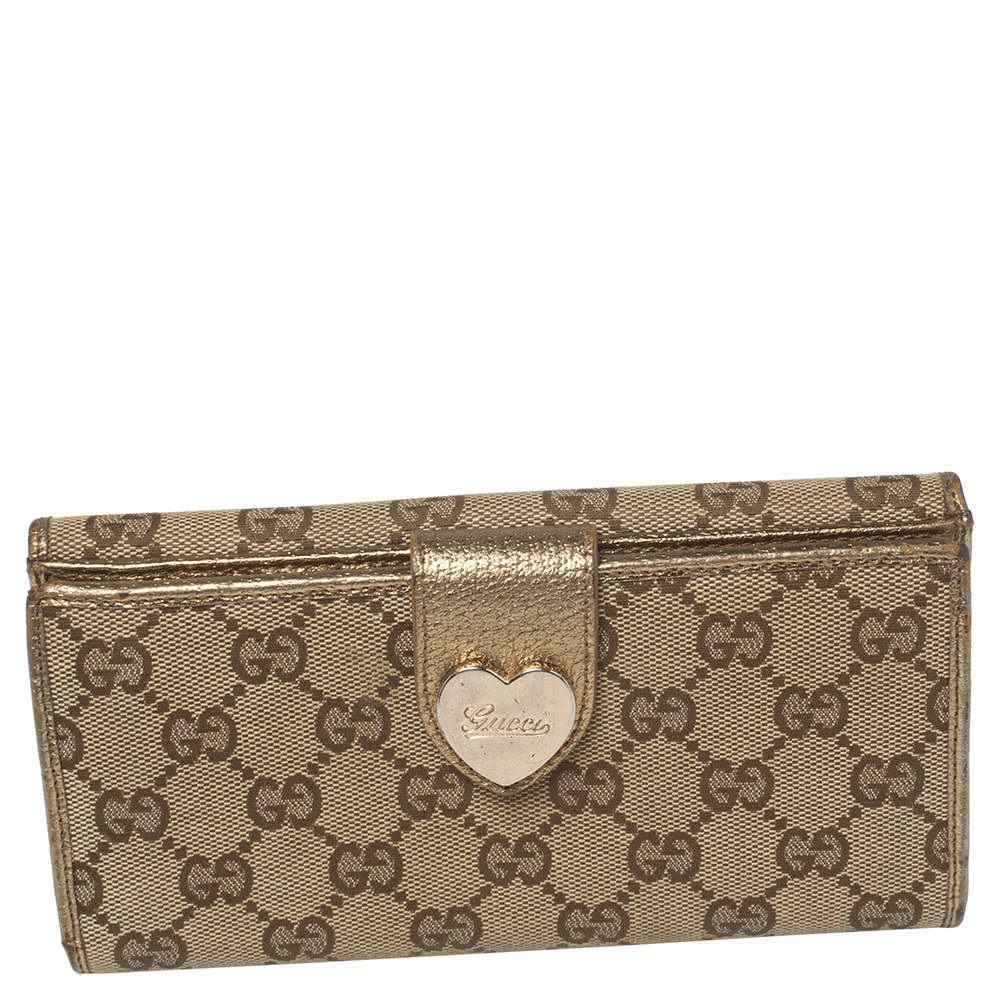مملوكة مسبقًا Gucci Beige/Metallic GG Canvas and Leather Continental Wallet