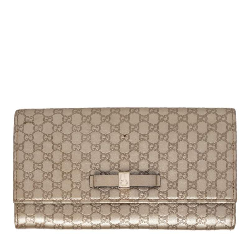 Pre Owned Gucci Gold Microguccissima Leather Bow Flap Continental Wallet