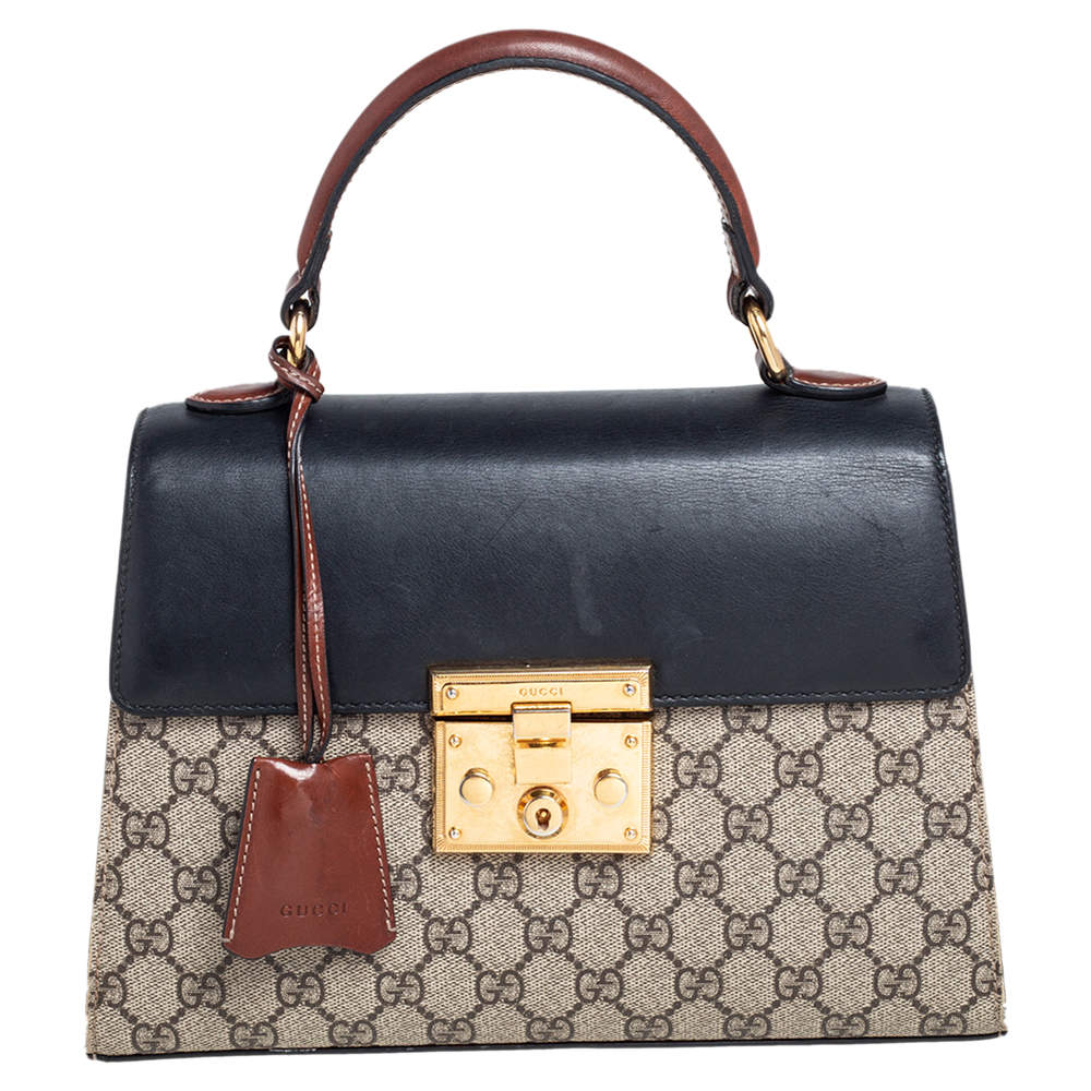 مملوكة مسبقًا حقيبة غوتشي جلد وكانفاس سوبريم GG بيج/أسود بيد علوية وقفل صغيرة 