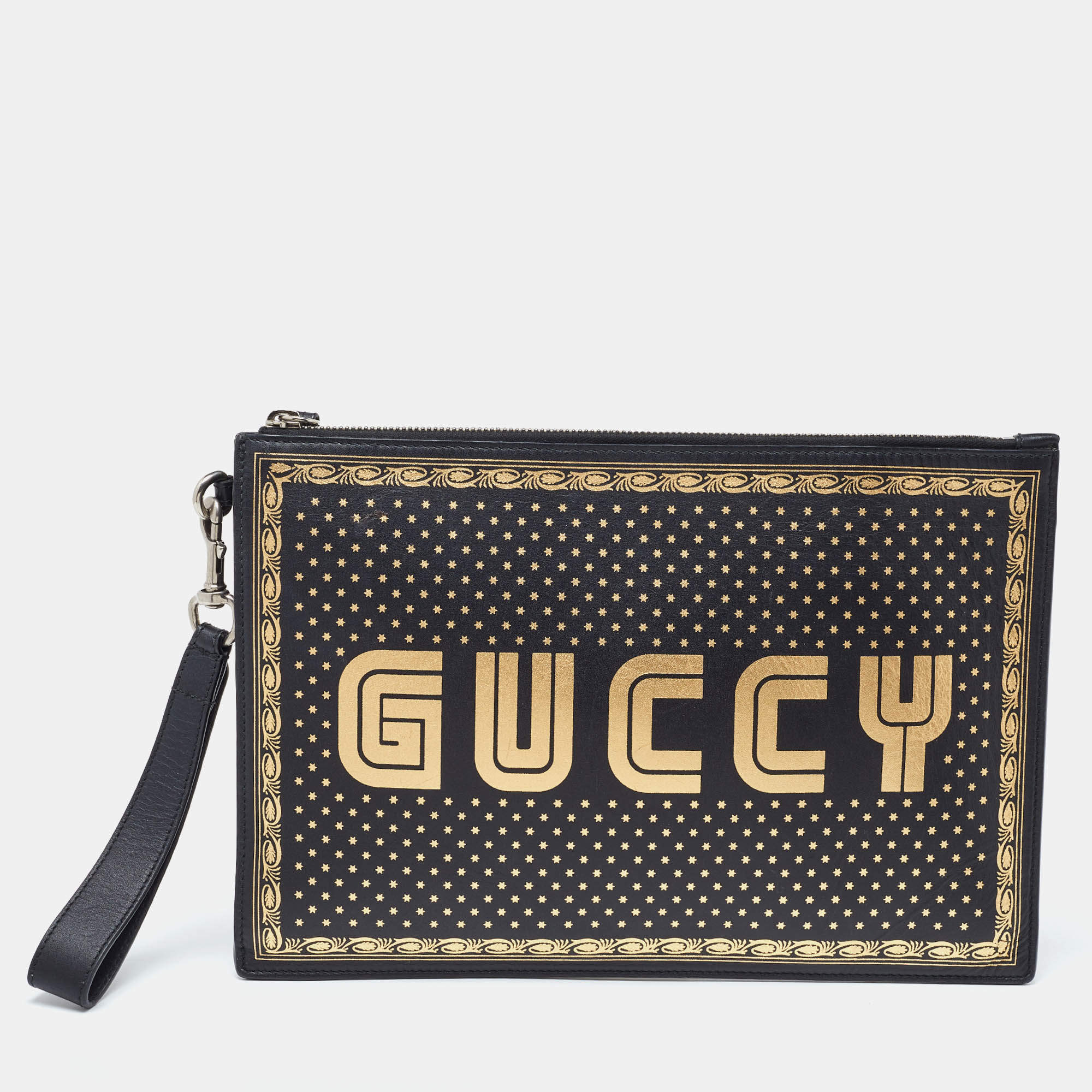 مملوكة مسبقًا Gucci Black Leather Guccy Star Wristlet Pouch