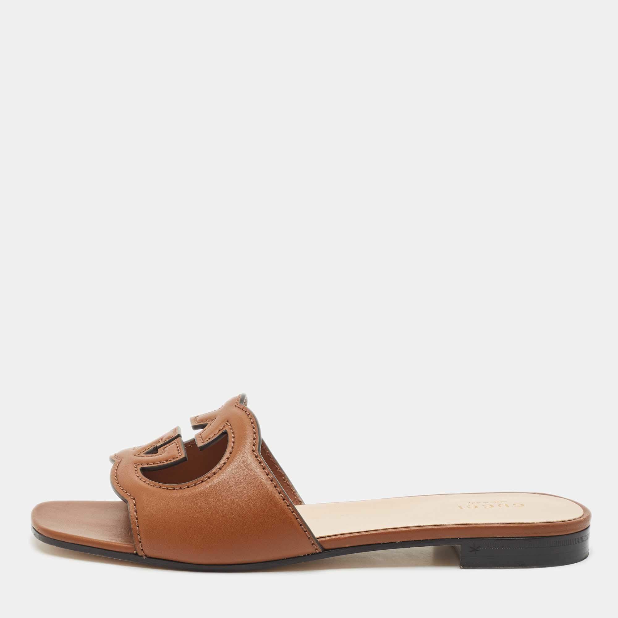 مملوكة مسبقًا Gucci Brown Leather Interlocking G Cut Out Flat Slides Size 38.5