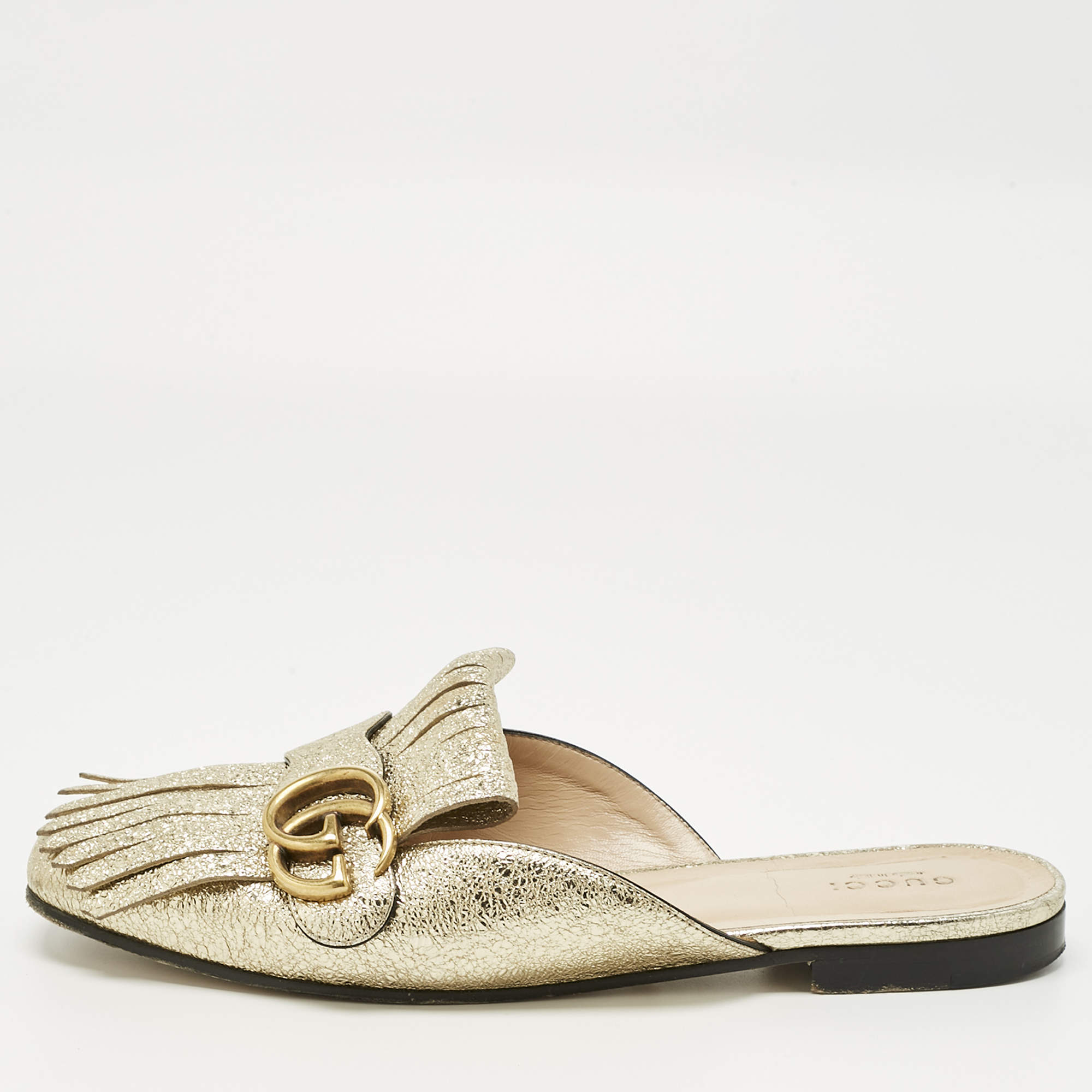 Pre Owned حذاء سلايد غوتشي مارمونت كيلتي جي جي بشراشيب جلد ذهبي ميتاليك مجعد