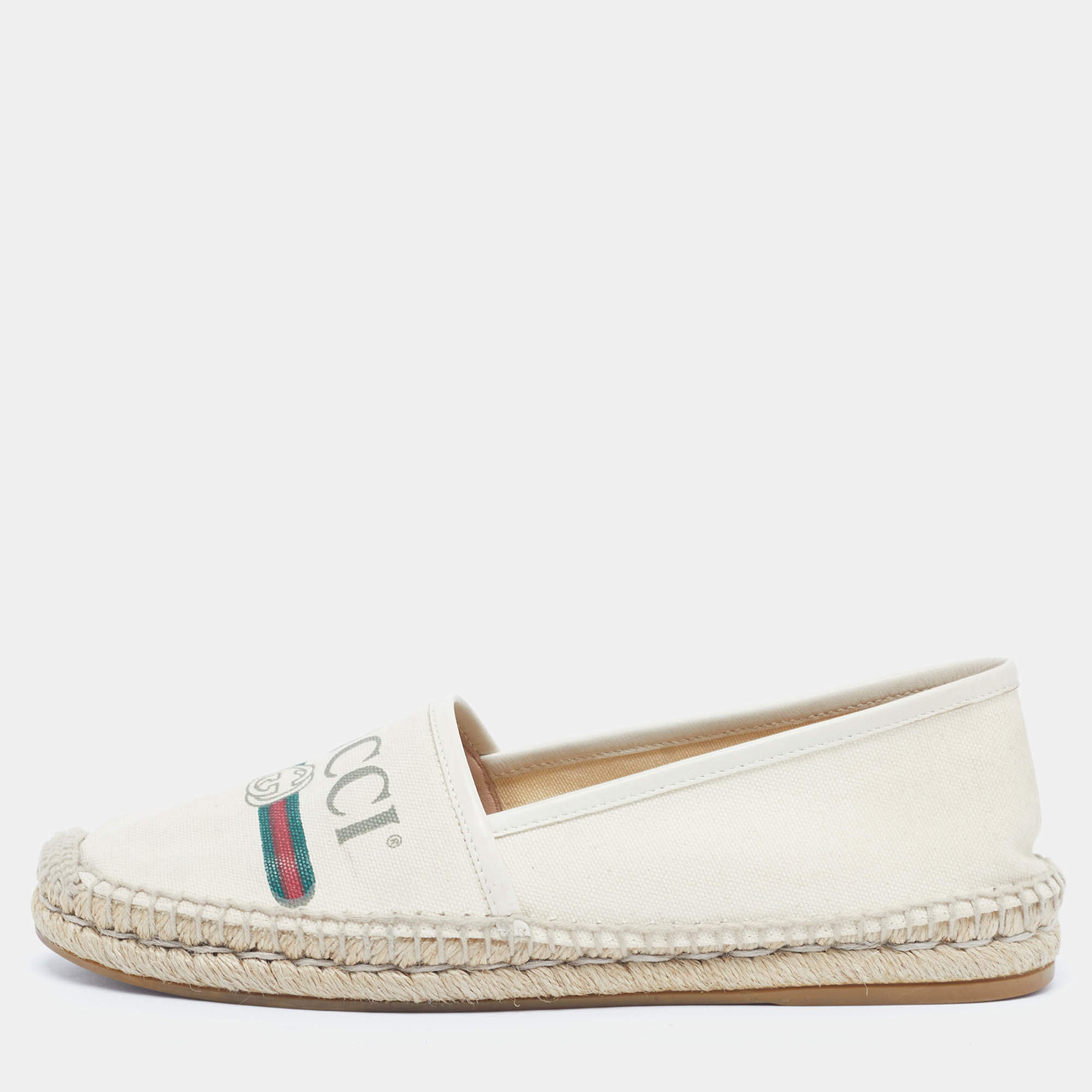 مملوكة مسبقًا حذاء إسبادريل غوتشي قماش وجلد أبيض مائل للأبيض مع طباعة شعار مقاس 38.5