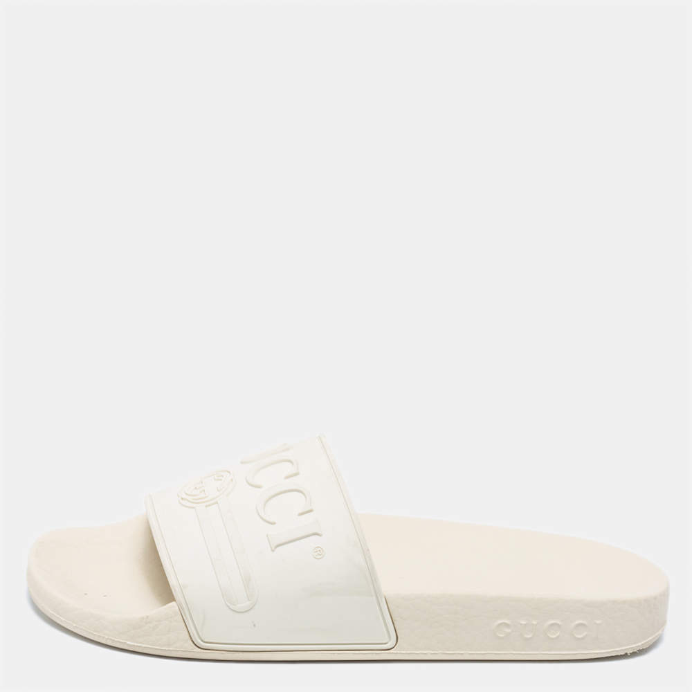 Pre Owned حذاء سلايدز غوتشي بول مطاط أوف وايت حرف جي متشابك مقاس36