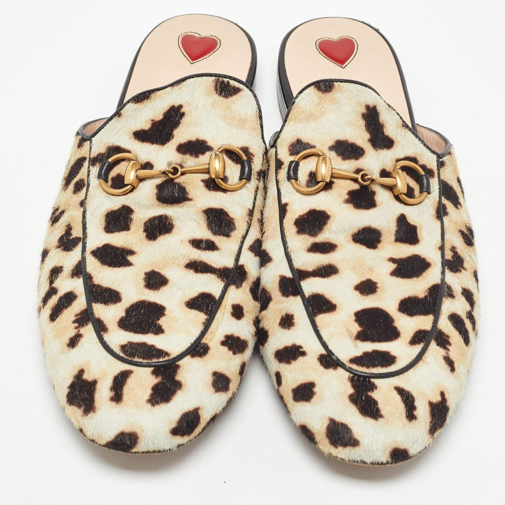 Gucci princetown leopard hot sale calf hair slipper