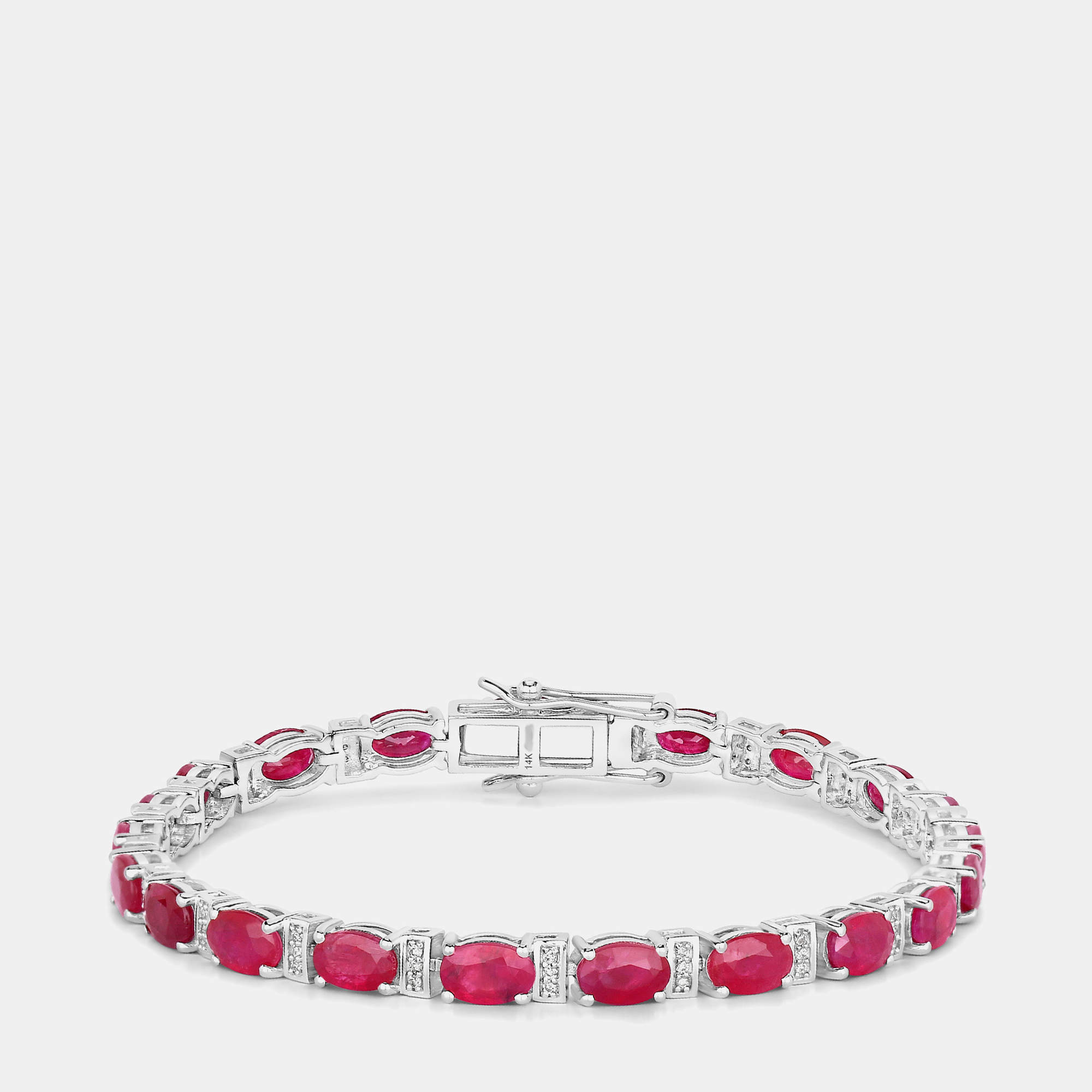 Pre Owned سوار التنس من الذهب الأبيض عيار 14 بحوالي 10.92 قيراط ياقوت وألماس