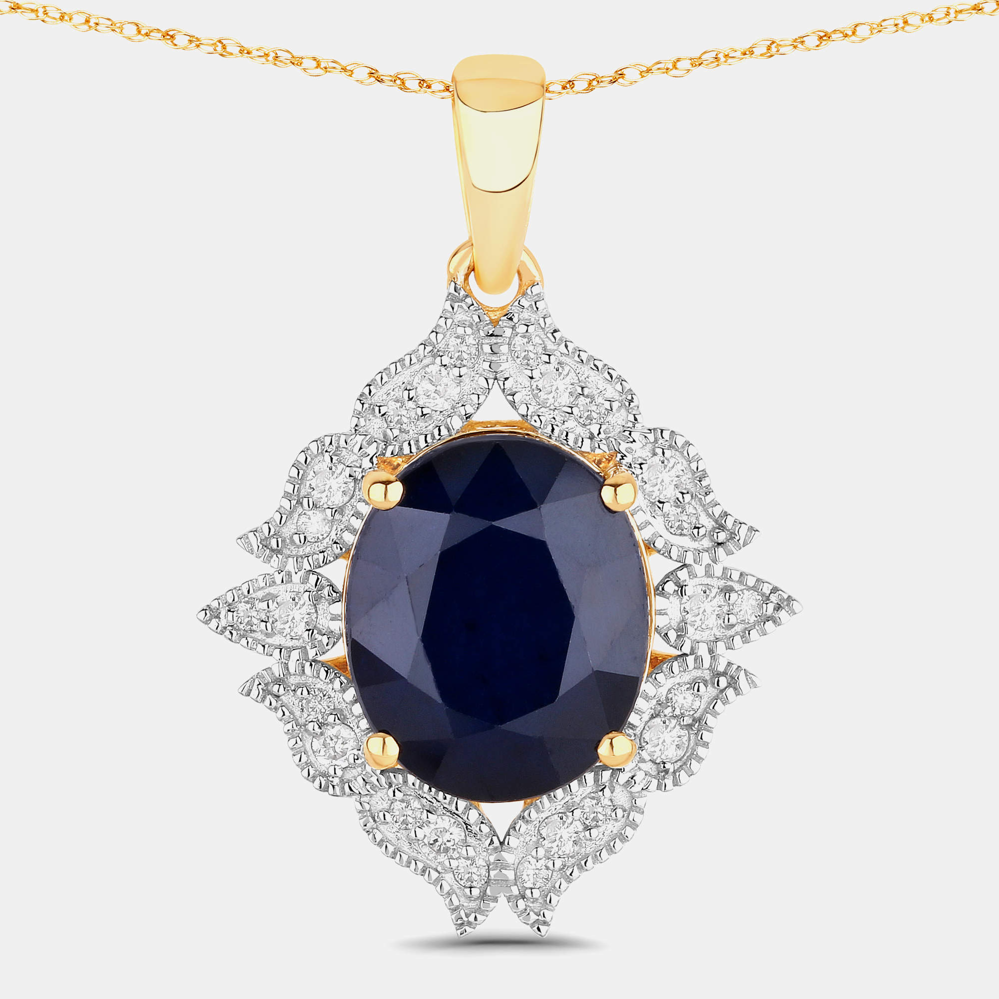 Pre Owned قلادة بحجر ياقوت أزرق وألماس بوزن 6.21 قيراط من ذهب أصفر عيار 14