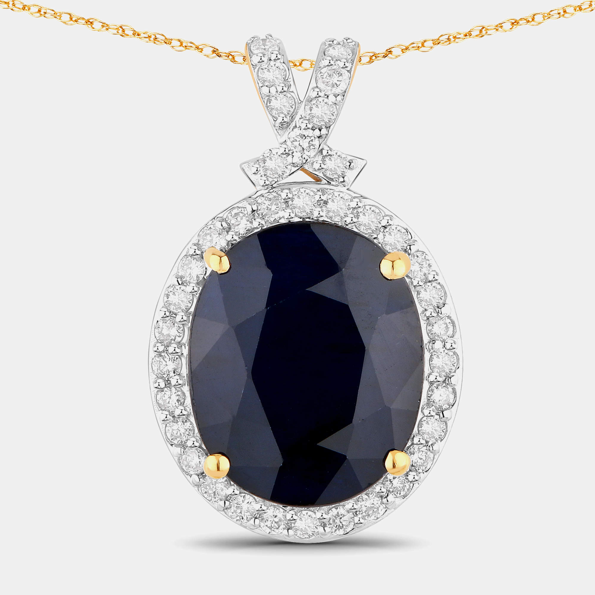 مملوكة مسبقًا 6.21 cts Blue Sapphire and Diamond 14K Yellow Gold Halo Pendant