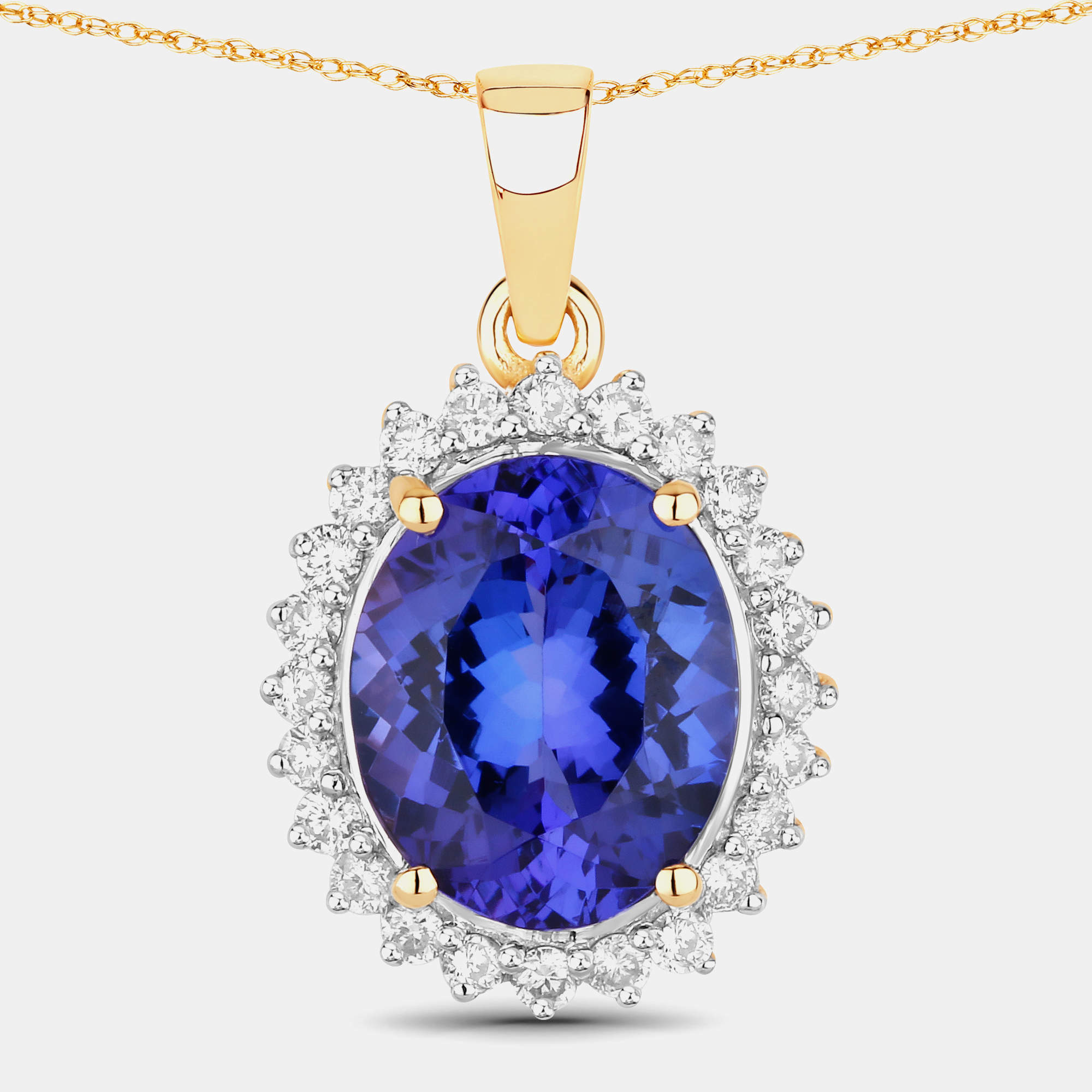 مملوكة مسبقًا 4.34 cts Tanzanite and Diamond 14K Yellow Gold Halo Pendant