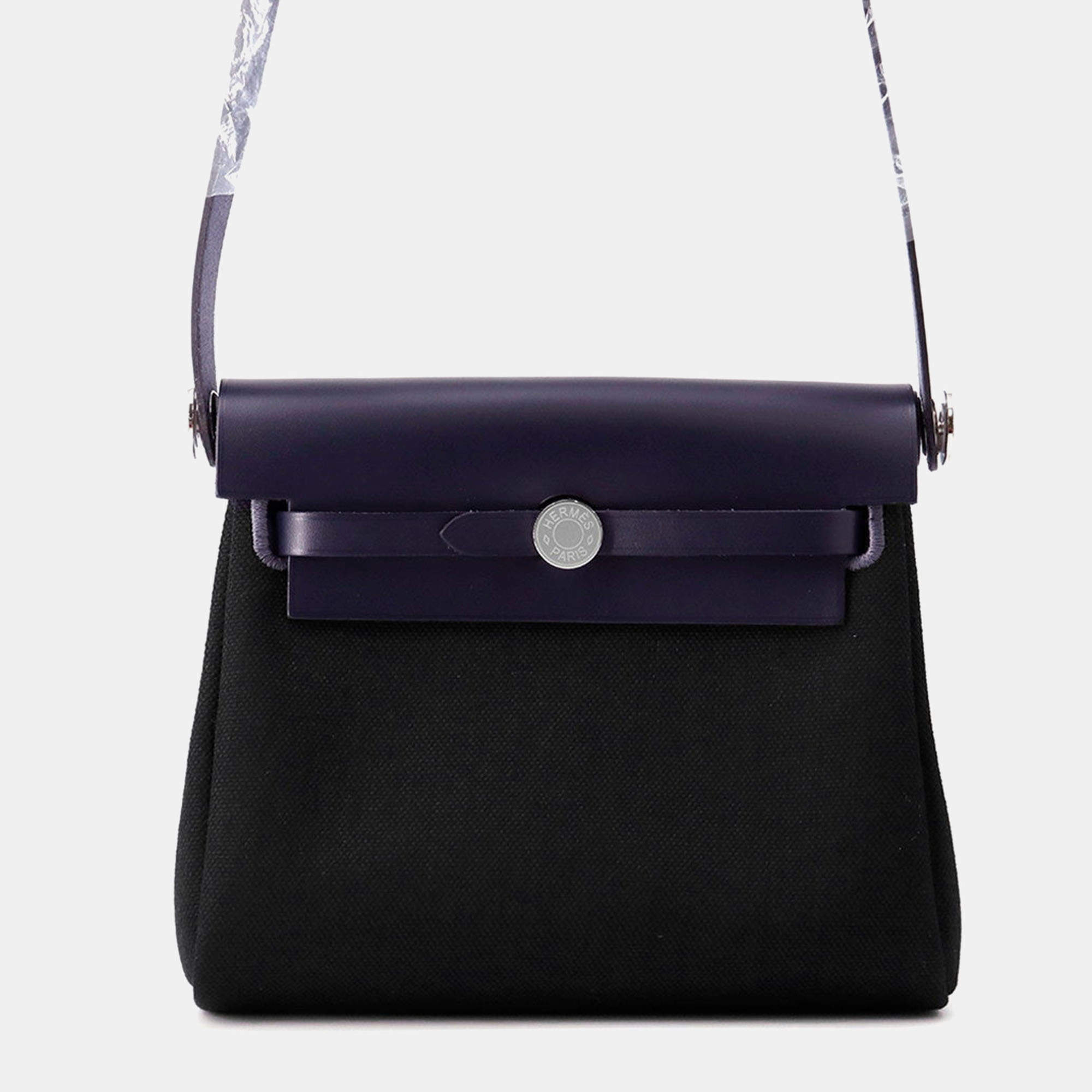 مملوكة مسبقًا حقيبة هيرمس هيرباج زيپ جلد فاش هنتر باللون الأزرق النيلي/الأسود تويل العسكرية حجم ميني