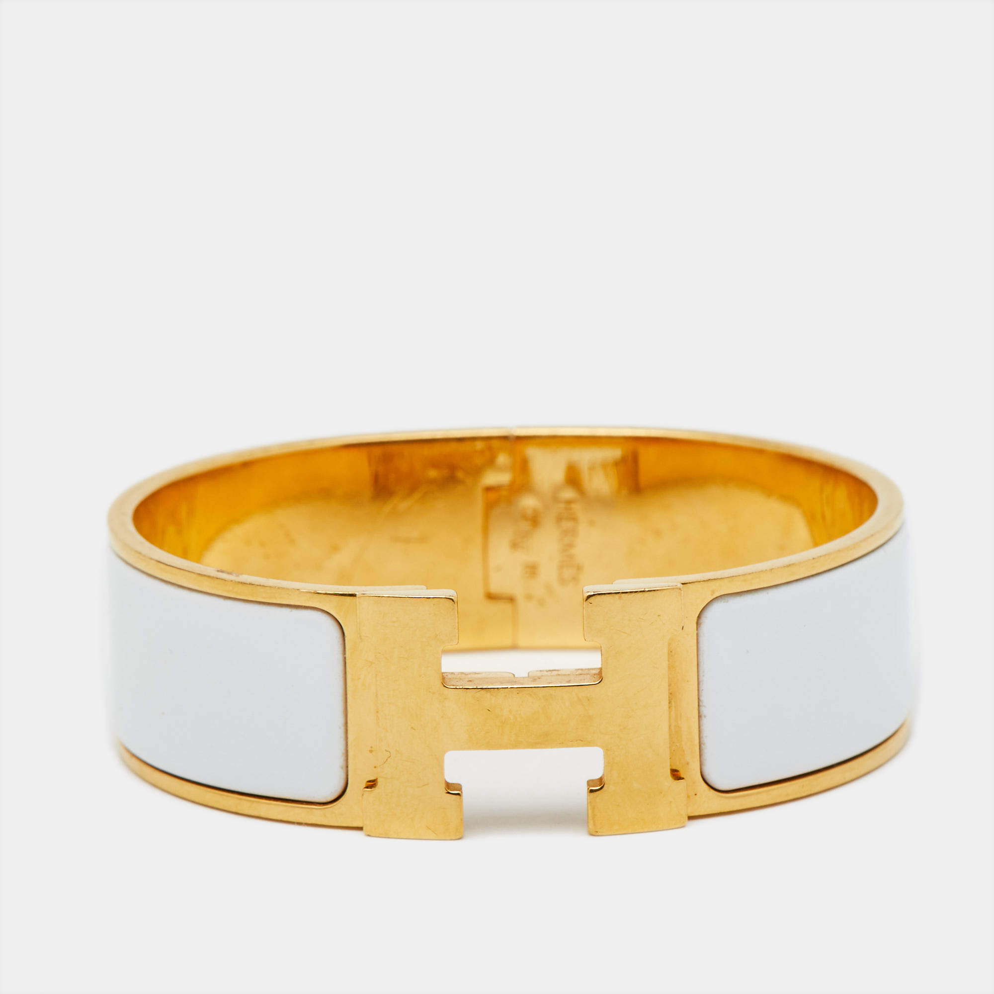 Pre Owned Hermès Clic Clac H White Enamel Gold Plated Wide Bracelet 