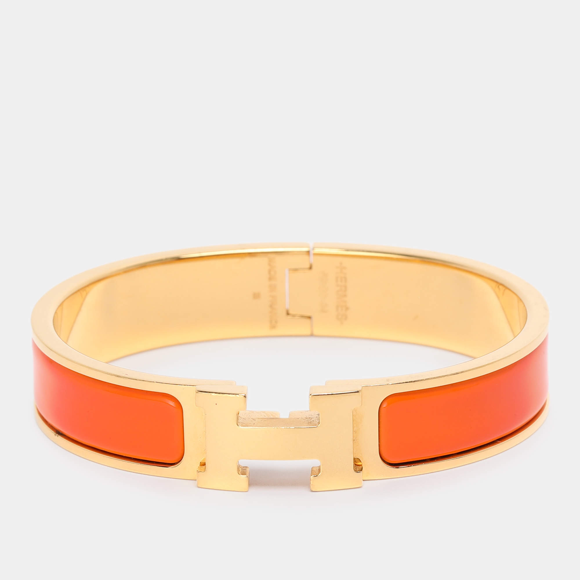 Pre Owned Hermes Clic H Orange Enamel Gold Plated Narrow Bracelet